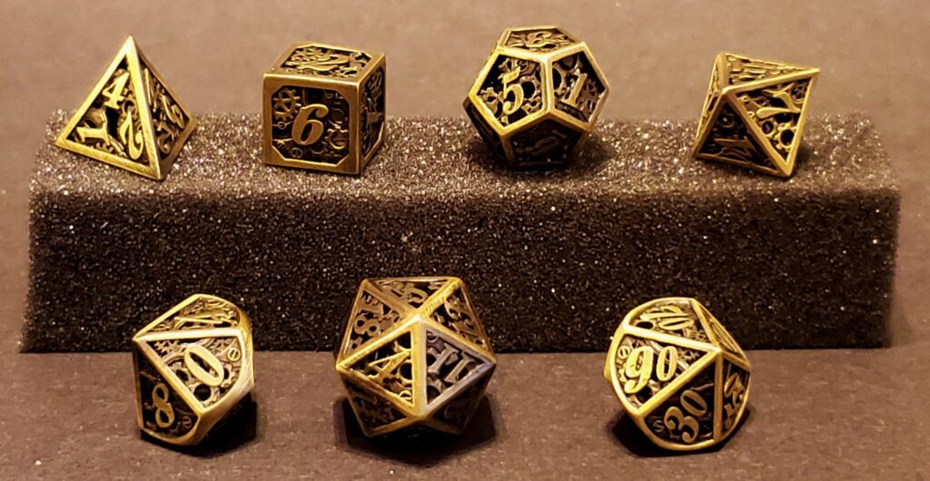 Steampunk Hollow 7-Piece Dice Set - Gold | Kessel Run Games Inc. 