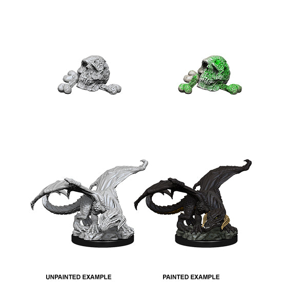 Nolzur’s Marvelous Miniatures: Black Dragon Wyrmling & Acid-Pitted Hill Giant Skull | Kessel Run Games Inc. 